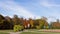 Motionlapse at autumn in the park with colorful trees and a spinning ferris wheel. Sigulda Latvia.