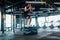 Motivated black male athlete doing balance exercise on cube in modern gym