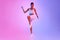 Motivated Fitness Woman Exercising Raising Knee Over Neon Studio Background