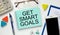 Motivation encouragement quote written on notepad - Get smart goals