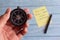 Motivational life quotes. Selective focus image of hand holding compass