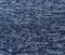 Motley blue knitted fabric, selective focus