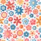 Motley summer print for fabric with embroidered satin stitch flowers on a white background. Seamless floral ornament. Vector