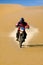 Moto racer in desert