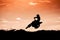 Motocross action with sunset background