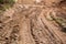 Motocross and auto sport track, background. Wheel tracks on sand