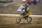 Motocross bikes racing in track