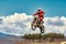 Motocross concept, a biker goes off-road making extreme skiing. In pursuit of adrinalin, sport concept. Dangerous sport.