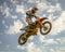Motocross Jump into the Sky during a Race