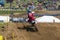 Motocross racer approaches jump at spring creek national