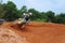 Motocross rider makes a hard corner training at Kemaman, Terengganu, Malaysia motocross track