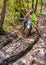 Motocross rider splashing mud on wet and muddy terrain. Open competitions in motocross in province of Varese.