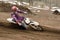 Motocross rider turns point-blank of sand