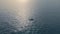 Motor boat floating sea shiny day aerial view. Ship sailing at marine landscape