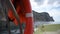 motor boat with orange life buoy ring and life jacket on board during leaving remote rocky mountain island during summer