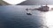 Motor boat sails on the sea between the islands of Gospa od Skrpjela and St. George. Panorama