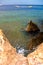 Motor boats, buoys on the sea and rocky coast. Egypt. Shallow de