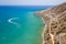 Motor boats leaving trail in Pissouri bay, Cyprus with Mediterranean sea on background, aerial seascape