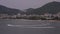 Motor boats with parasailers float on the sea near the resort coast