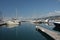 Motor boats and sailboats in harbor in Trieste, Italy