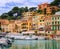Motor boats and traditional houses in Puerto Soller, Mallorca, S