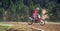 Motor cross rider on track