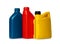 Motor oil in different containers on white background