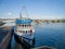 The motor ship stands at the pier on the Yenisei River