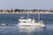 Motor trawler Nobska Light crossing New Bedford outer harbor