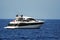 Motor yacht anchored in a calm bay