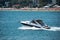 Motor yacht speeding on water