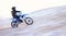 Motorbike, desert and fast man training for sports, motion blur or travel journey outdoor. Motorcycle, speed and driver