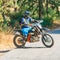 Motorbike driver portrait sitting on Bike