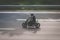 Motorbike driving fast on highway , motion blur