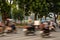 Motorbike motion at Hoan Kiem lake and turtle tower in the background