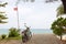 Motorbike near nice tropical beach with some palms