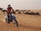 Motorbike rider in desert