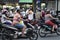 Motorbikes, motorcycles and scooters in Hanoi. Motorbike traffic jam and facemasks in the crowded city of Hanoi, Vietnam