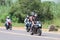 Motorbikes travelling through city streets at Yearly Mass Ride