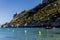 Motorboat in calm sea harbour and rocky mountains in Calanques de Marseille