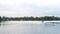 Motorboat Cruising In The Lake Against View Of Nature