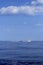 Motorboat fisherboat cruising speed on blue sea