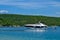 Motorboat with jet ski moored on a sea