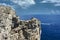 Motorboat and rocky coast of the Greek island