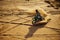 Motorcross riding over sand in desert dune