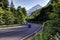 Motorcycle on the Curved road leading to the mountains