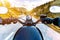 Motorcycle driver riding in Alpine highway, handlebars view, Austria, Europe.