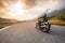 Motorcycle driver riding in Dolomite pass, Italy, Europe.