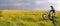 Motorcycle going at high speed through a field.