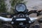 motorcycle handlebar controls including speedometer